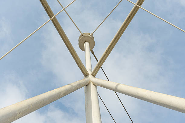 istock Truss Joint Detail: Converging Metal Beams Against Blue Cloudy Sky 2206903387