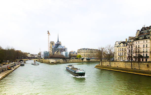 istock Paris, France: Seine River, Notre Dame Cathedral Spire Under Construction 2206903864