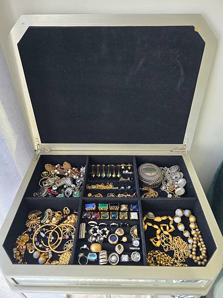 istock Elegant Jewelry Box Display with Gold and Gemstone Accessories 2206904037