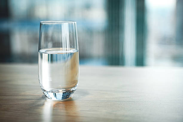 istock glass of clean water on the table 2206904957