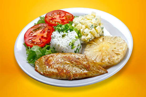 istock Grilled pork with fries and vegetables 2206908608