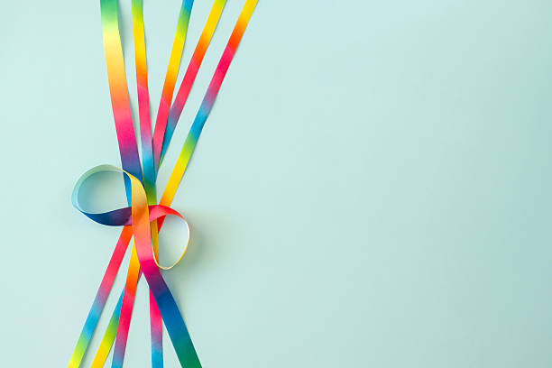 istock Autism acceptance month, Autism awareness day background. Infinity symbol and ribbons. Infinity loop is symbol of autism disorder, adhd, neurodiversity, limitlessness, eternity 2206909054