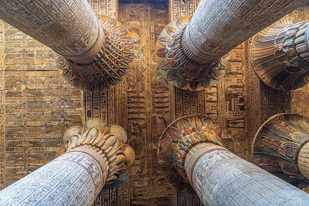istock Inside Esna Temple, the imposing columns adorned with hieroglyphs stretch towards the ornate ceiling. 2206909672