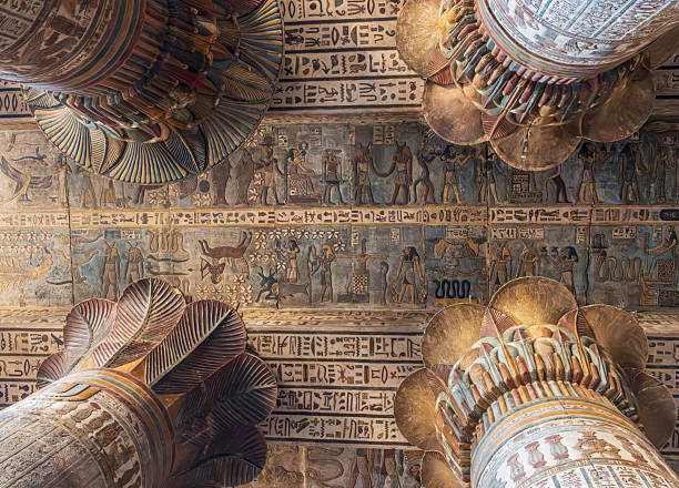 istock Inside Esna Temple, the imposing columns adorned with hieroglyphs stretch towards the ornate ceiling. 2206909734