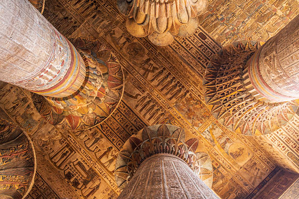 istock Inside Esna Temple, the imposing columns adorned with hieroglyphs stretch towards the ornate ceiling. 2206909943