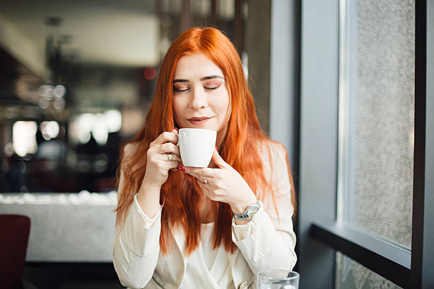 istock Woman enjoying coffee 2206910993