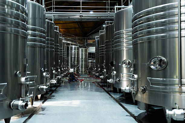 istock Stainless Steel Fermentation Tanks in Winery Close-Up 2206911000