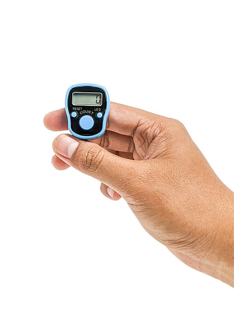 istock a blue and black handheld digital counter with a small display showing zero, placed on a white background. 2206913275