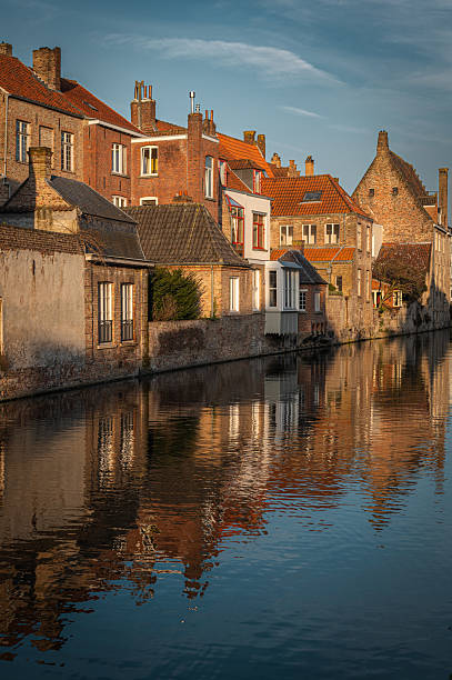 istock Bruges Canals Reflecting Historic Architecture at Sunset 2206918457