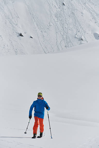 istock A Skier Scales a Treacherous Alpine Peak 2206921906