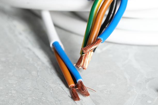 istock Colorful electrical wires on gray textured surface, closeup 2206930091