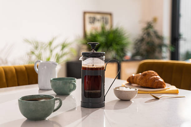 istock French Press Cafetiere and Croissant in the morning 2206934032