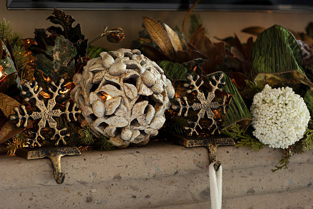 istock Christmas holiday decorations on a concrete mantle 2206934696