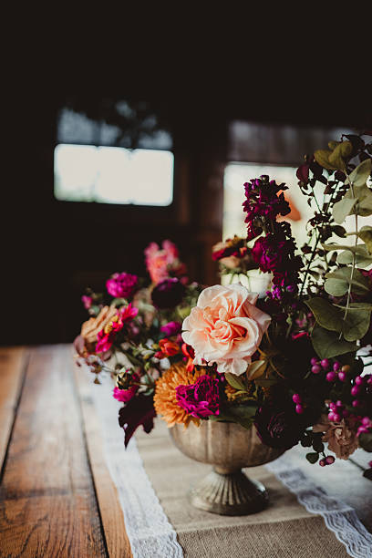 istock Wedding reception with flower centerpiece arrangement in vase 2206936122