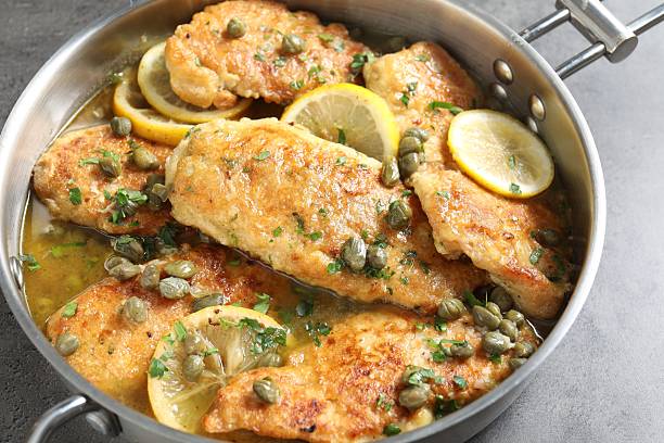 istock Delicious chicken piccata on grey table, closeup 2206937746
