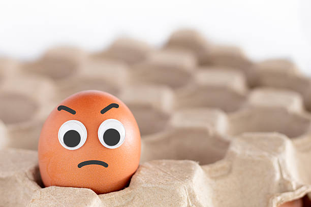 istock Egg with angry face in recycled cardboard 2206938905