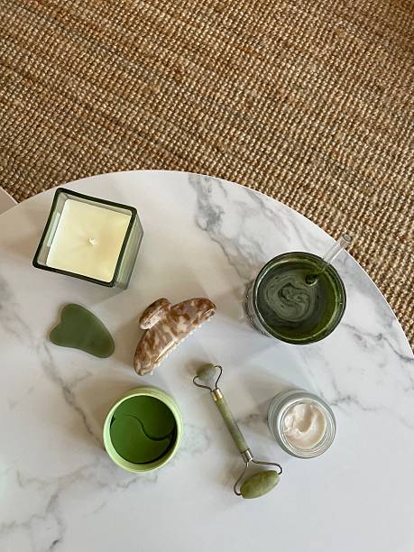 Wellness and self-care products arranged on a marble table