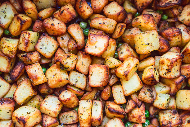 air fried cubed potatoes close-up shot, concept of simple natural healthy ingredients