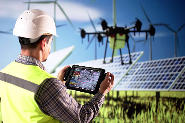 istock Man In Field With Solar Panels, Drone Flying Overhead 2206946583