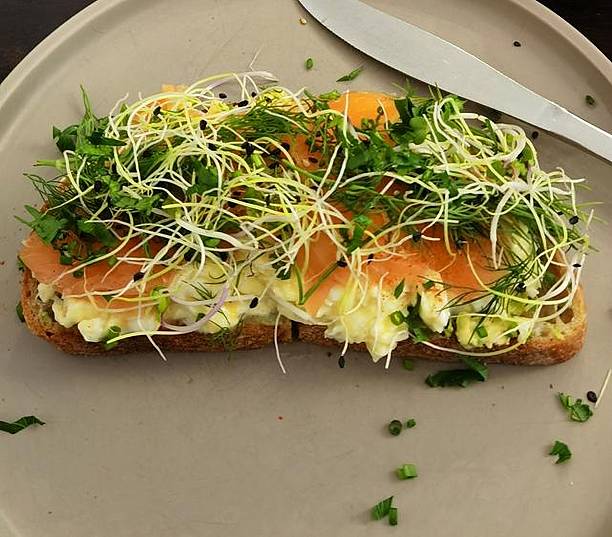 istock Open-faced sandwich with smoked salmon and herbs. 2206946926