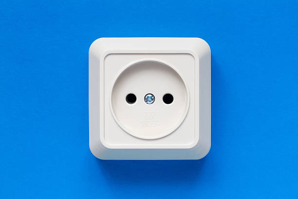 istock European electrical outlet on a blue background. 2206950298
