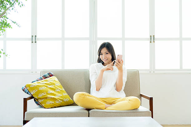 istock young woman calling on smartphone 2206952074