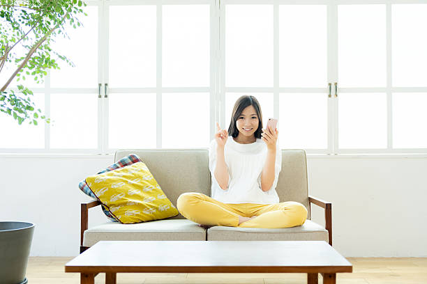 istock young woman calling on smartphone 2206952085