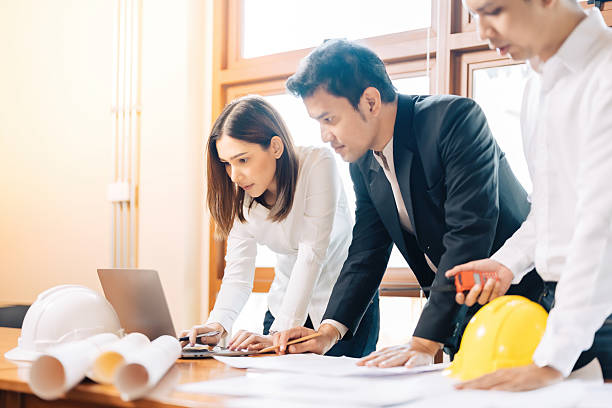 istock The Architects Group office is where experts create blueprints and innovative designs in architecture to develop modern houses and buildings that redefine urban landscapes. 2206960139