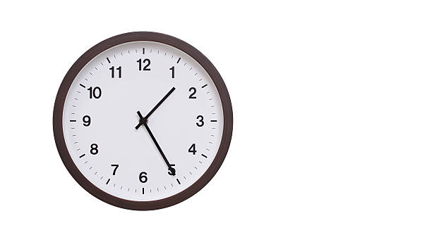 istock A simple round wall clock with a dark brown frame and a white face displaying 13.25/01.25. Isolated on a white background, perfect for time-related concepts, deadlines, and schedule themes. 2206961215