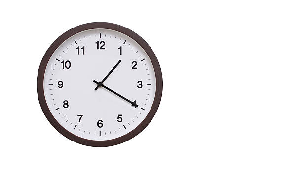 istock A simple round wall clock with a dark brown frame and a white face displaying 13.20/01.20. Isolated on a white background, perfect for time-related concepts, deadlines, and schedule themes. 2206961216