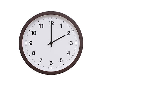 istock A simple round wall clock with a dark brown frame and a white face displaying 14.00/02.00. Isolated on a white background, perfect for time-related concepts, deadlines, and schedule themes. 2206961235