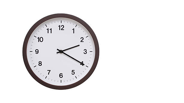 istock A simple round wall clock with a dark brown frame and a white face displaying 14.20/02.20. Isolated on a white background, perfect for time-related concepts, deadlines, and schedule themes. 2206961237