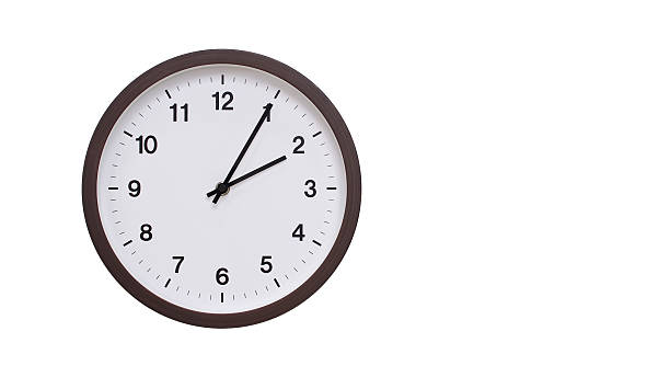 istock A simple round wall clock with a dark brown frame and a white face displaying 14.05/02.05. Isolated on a white background, perfect for time-related concepts, deadlines, and schedule themes. 2206961242