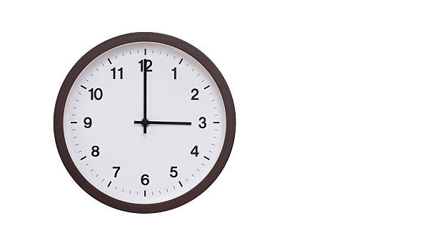 istock A simple round wall clock with a dark brown frame and a white face displaying 15.00/03.00. Isolated on a white background, perfect for time-related concepts, deadlines, and schedule themes. 2206961255