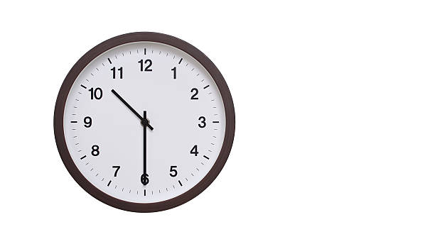 istock A simple round wall clock with a dark brown frame and a white face displaying 10.30/22.30. Isolated on a white background, perfect for time-related concepts, deadlines, and schedule themes. 2206962166