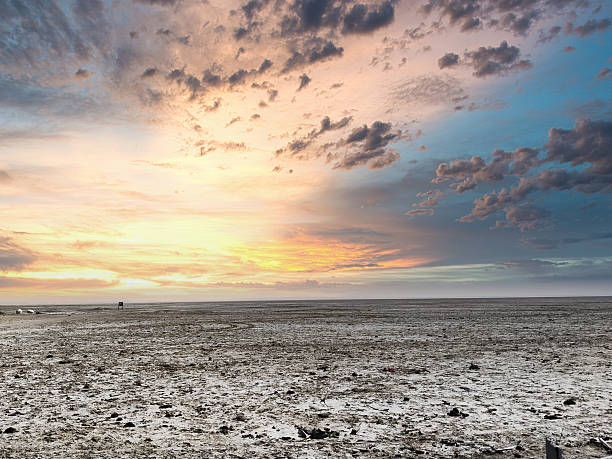 istock Sunset with clouds and sky in background at salt lake Sambhar 2206963677