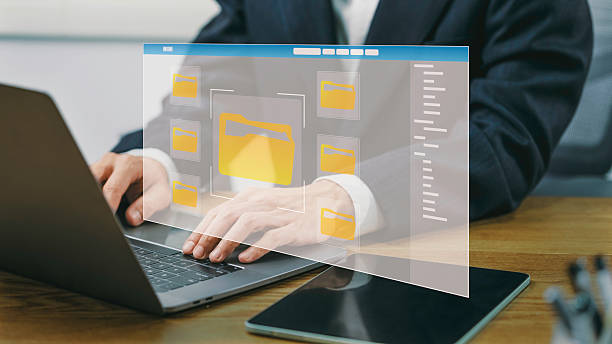 istock Business people use computers to manage documents without paper, store large amounts of data, and organize them systematically with automated document management systems. 2206966258