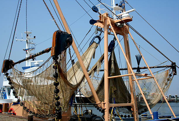 Netherlands,Groningen,Lauwersoog,july 2017: Nets hang out to dry in the harbor of Lauwersoog