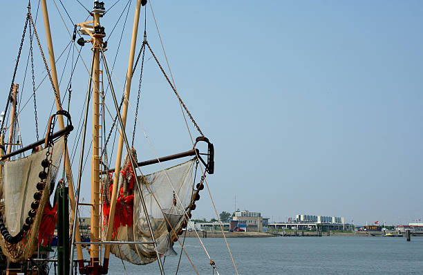 Netherlands,Groningen,Lauwersoog,july 2017: Nets hang out to dry in the harbor of Lauwersoog