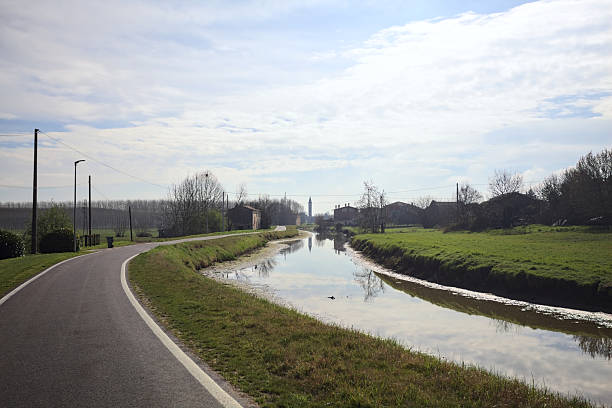 istock Stream of water next to a village 2206971895