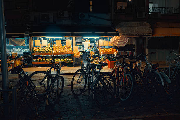 Night. The small bicycle parking area set up at the apartment.