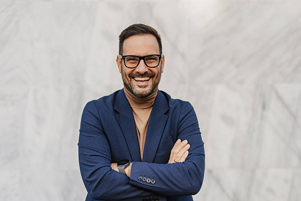 istock Businessman crossing arms with a big smile. 2206972143