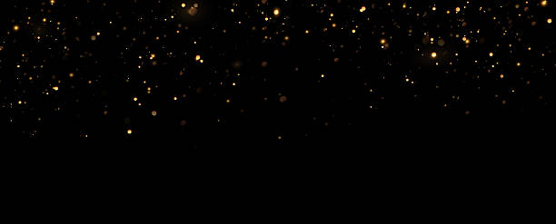 istock Christmas bright gold dust.A magical flash of bright particles 2206972324