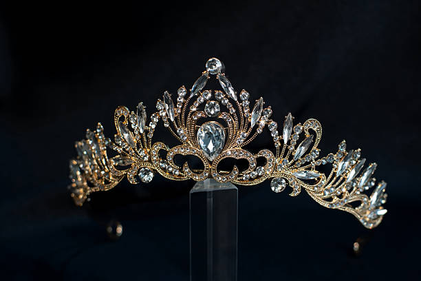 istock Luxury golden crown with gemstones and diamonds 2206977436