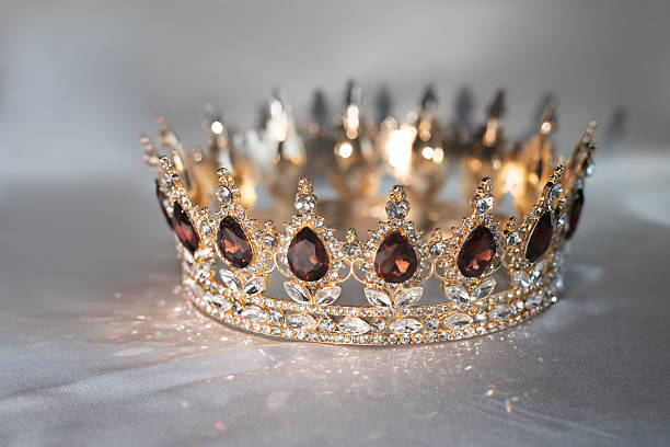 istock Luxury golden crown with citrine gemstones and diamonds 2206977756