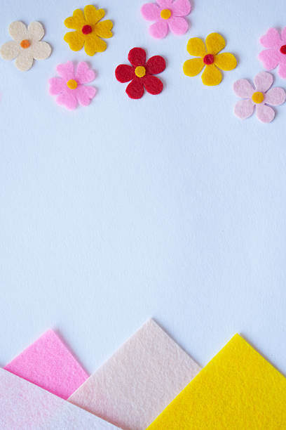 istock Floral felt composition, pastel background, DIY craft idea, handmade textile decoration, colorful petals, soft sewing project, creative design, spring-inspired home decor 2206979076