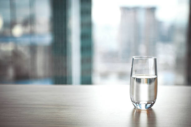istock glass of clean water on the table 2206979691