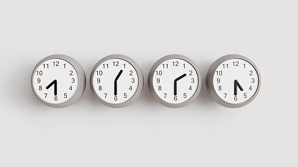 istock Four wall clocks with time around the world on a white wall, clocks 2206980862