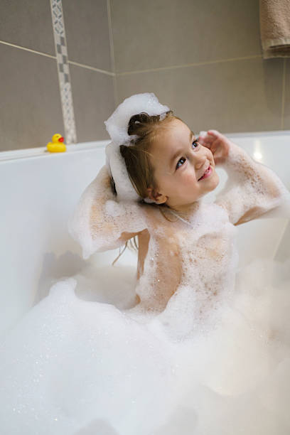 istock Girl enjoys a bubbly bath 2206981221