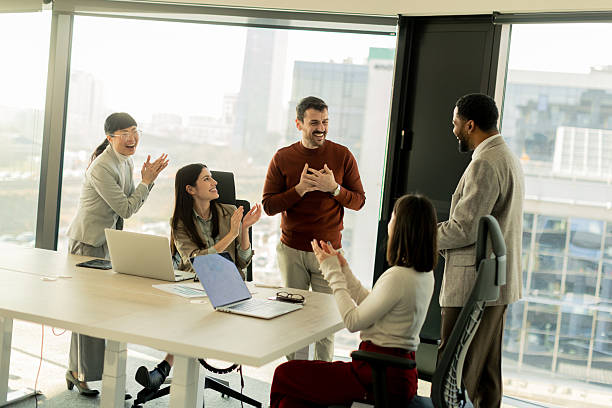 istock Collaboration among diverse professionals in modern office space during a strategic meeting 2206982470